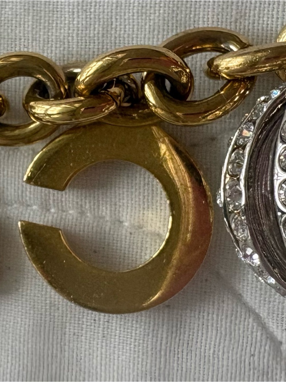 Coach Gold and Silver Tone Charm Bracelet with Crystal Accents - Picture 5 of 9